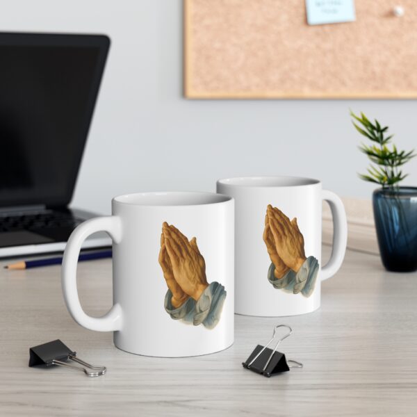 Praying Hands 11oz Mug exudes a sense of tranquility and spirituality